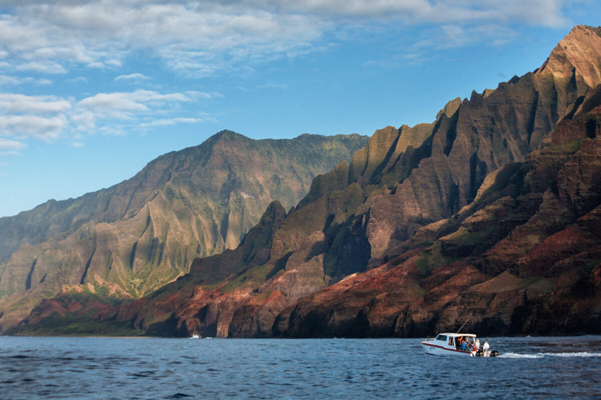 Boat Heading to Kauai’s Wild Na Pali Coast horizontal