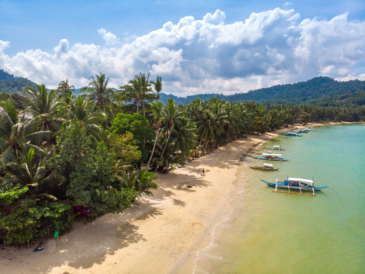Aerial view of Port Barton Beach on paradise island, tropical travel destination - Port Barton, San Vicente, Palawan, Philippines.
