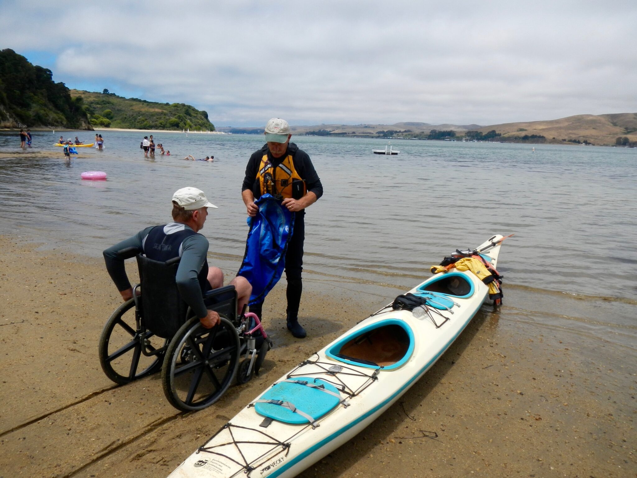 wheelchair user accessing ocean at California State Coastal Conservancy