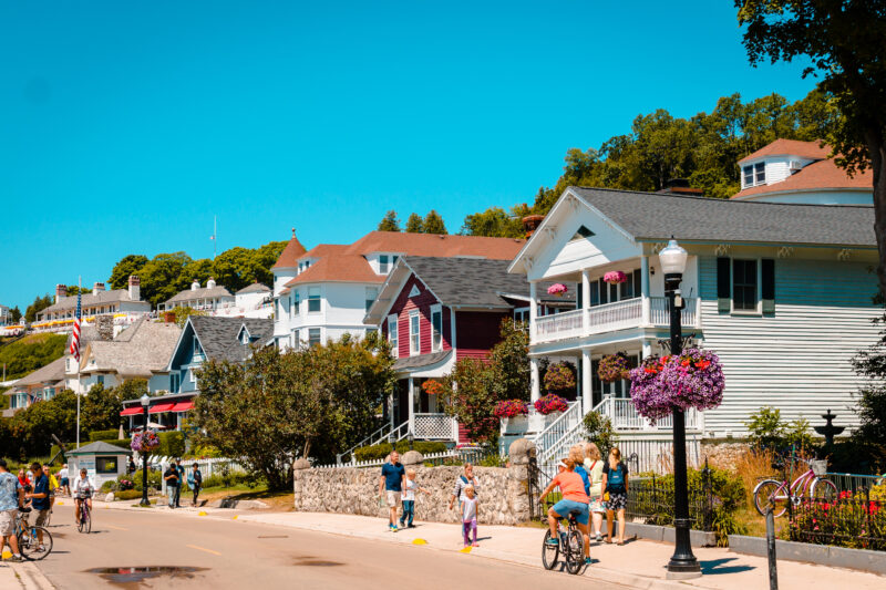 Some of houses near downtown Mackinac Island. Street view of some of the bed and breakfasts on Mackinac Island during the summer in Michigan