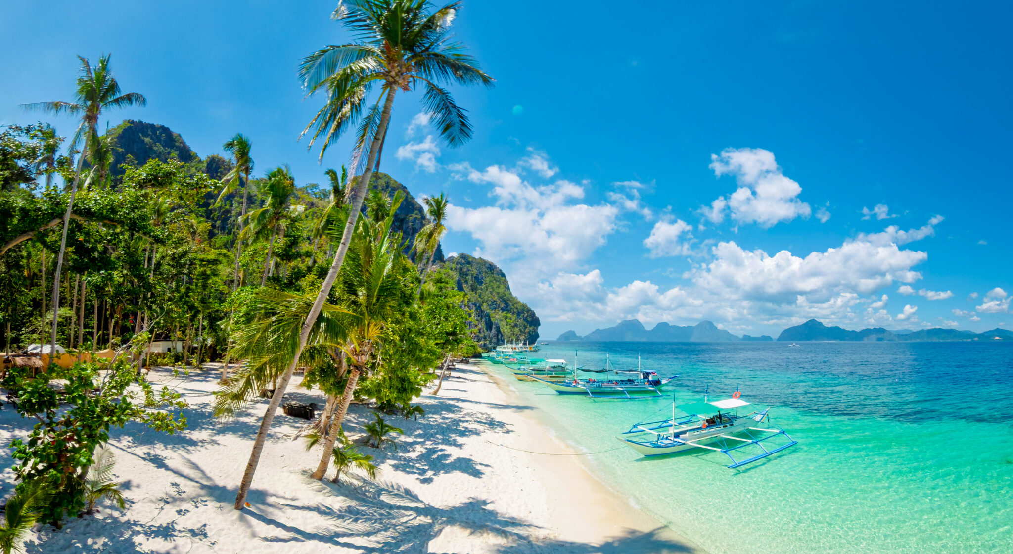 We Asked 6 Travel Experts for Their Favorite Beach Town — The Answers Surprised Us