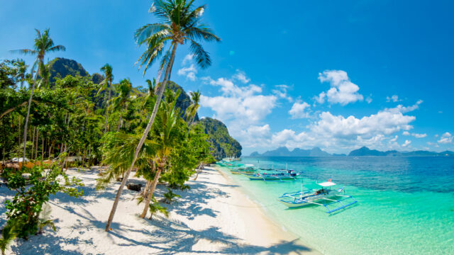 We Asked 6 Travel Experts for Their Favorite Beach Town — The Answers Surprised Us
