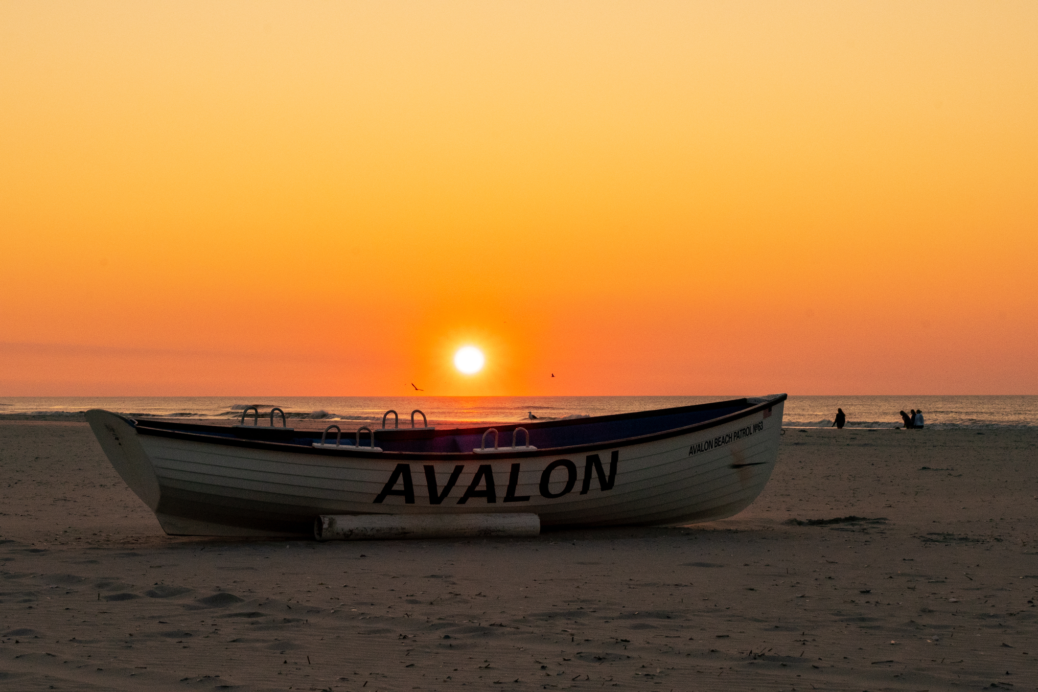 An Avalon Lifeguard Boat on the beach at Sunrise in Avalon, New Jersey.
