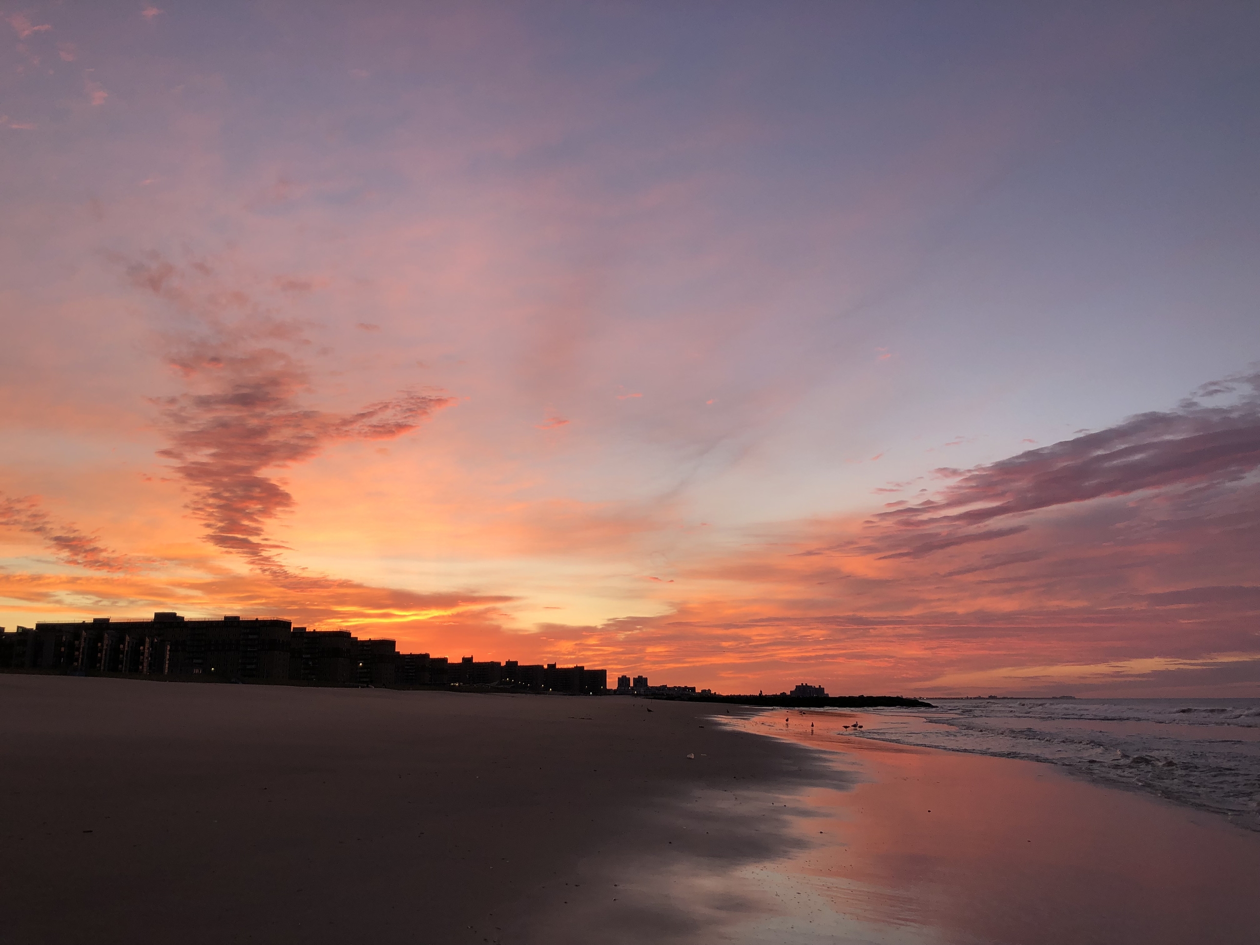 Dawn in June at Rockaway Beach in Queens, New York, NY.